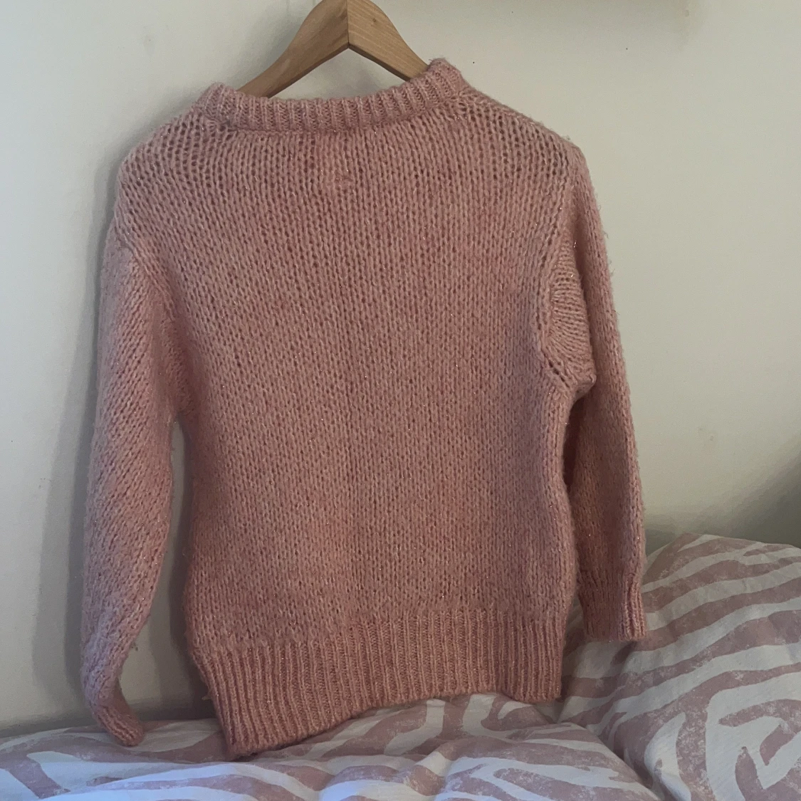 Rosa stickad tröja