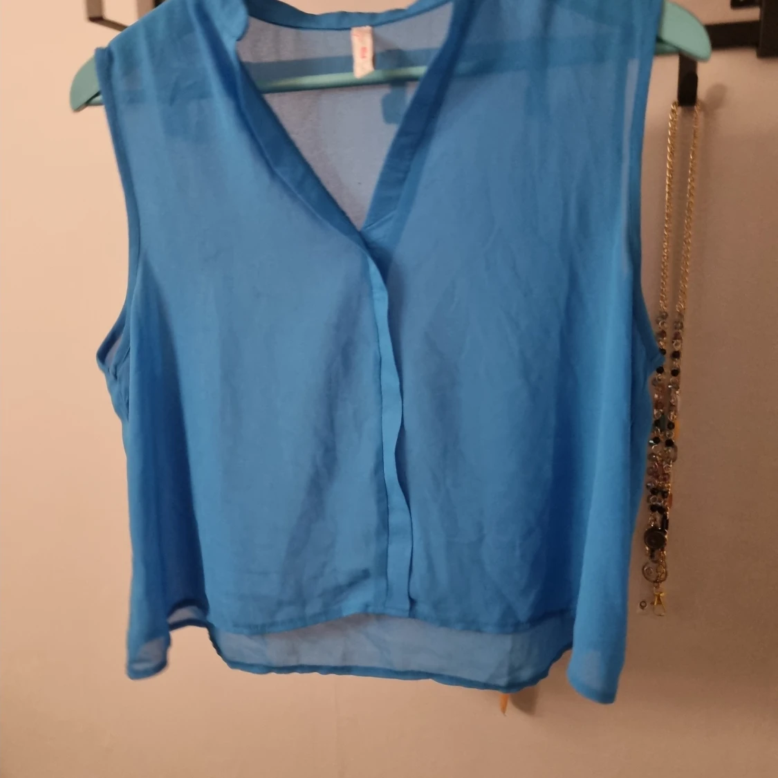 Blå ärmlös blus - 1