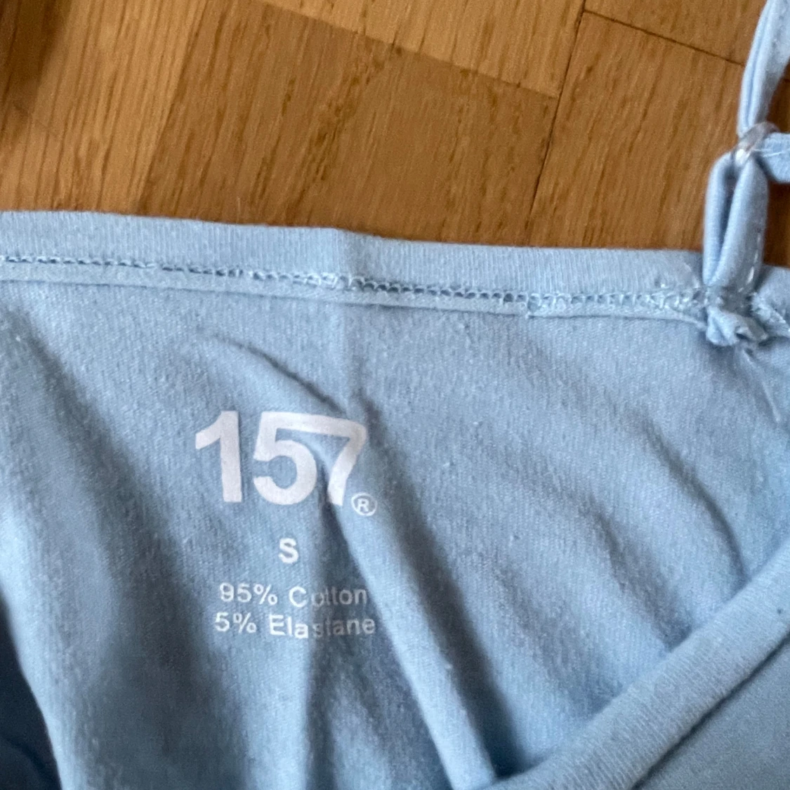 Ljusblå croppad linnetopp från 157 - 1