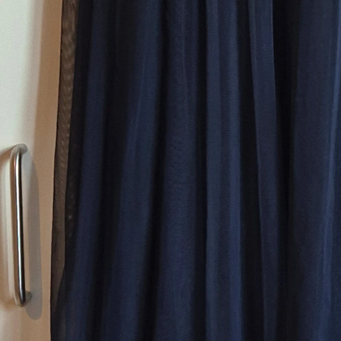 Mörkblå klänning med paljetter