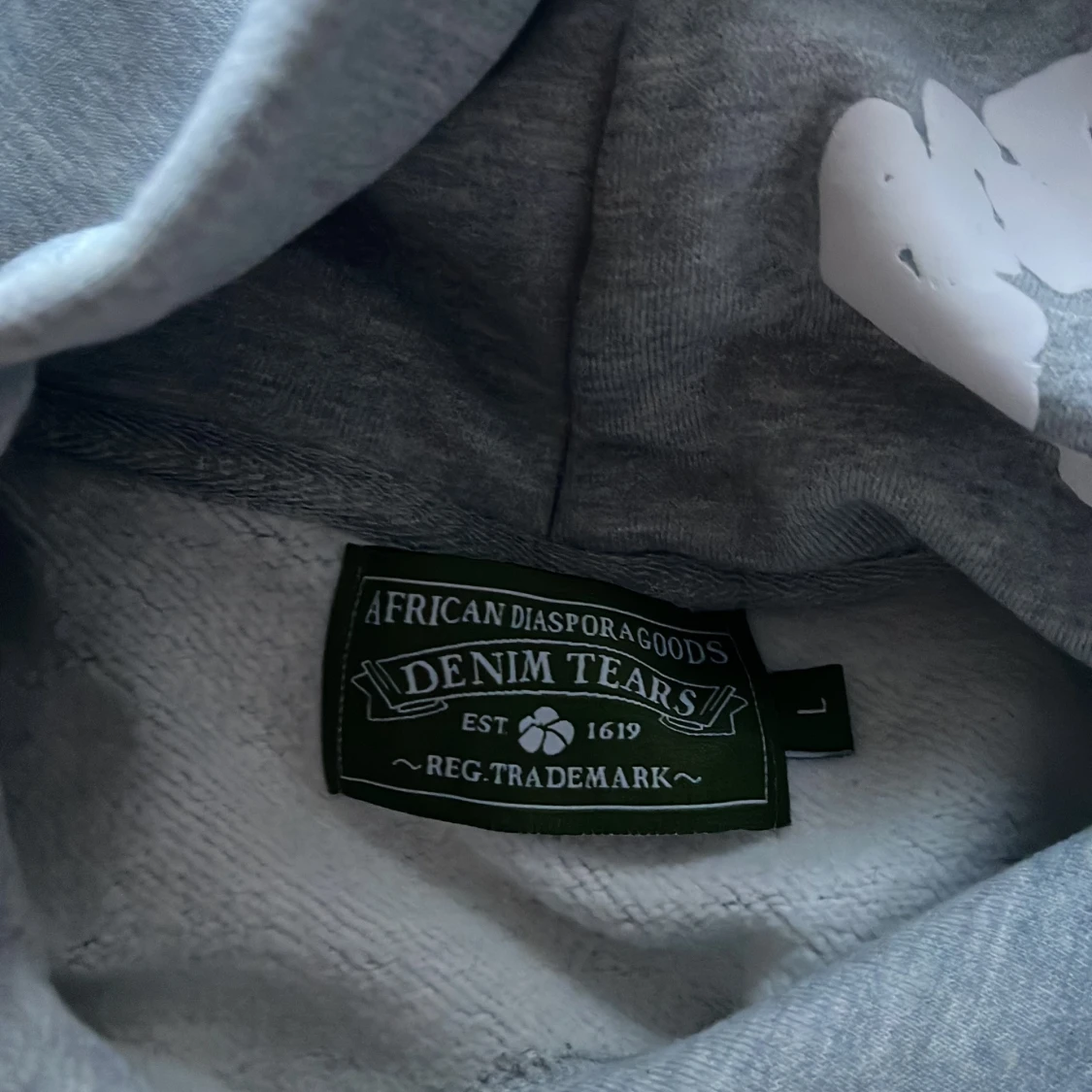 Grå hoodie från Denim Tears med blommor - 1