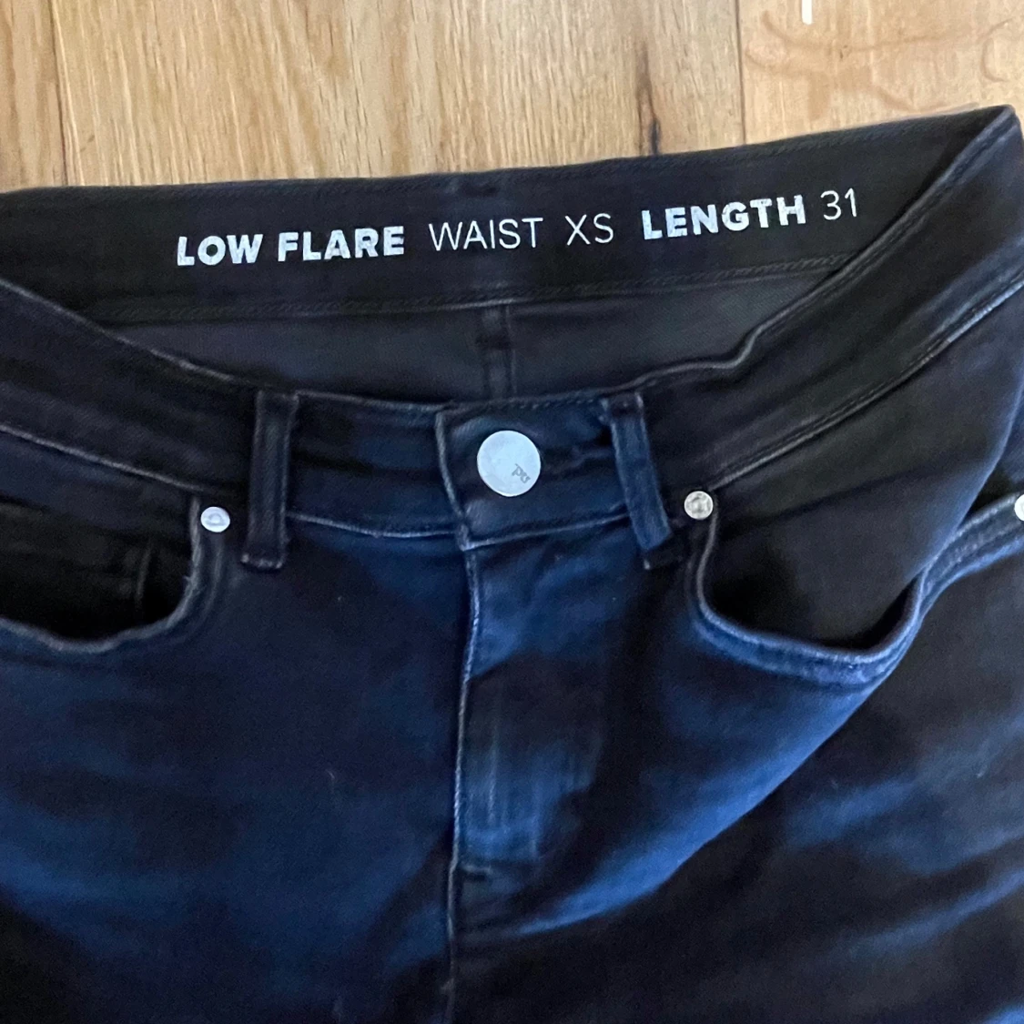 Svarta lågmidjade flare jeans XS - 1