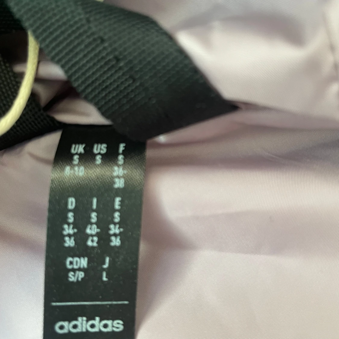 Ljuslila pufferjacka från Adidas Terrex - 3