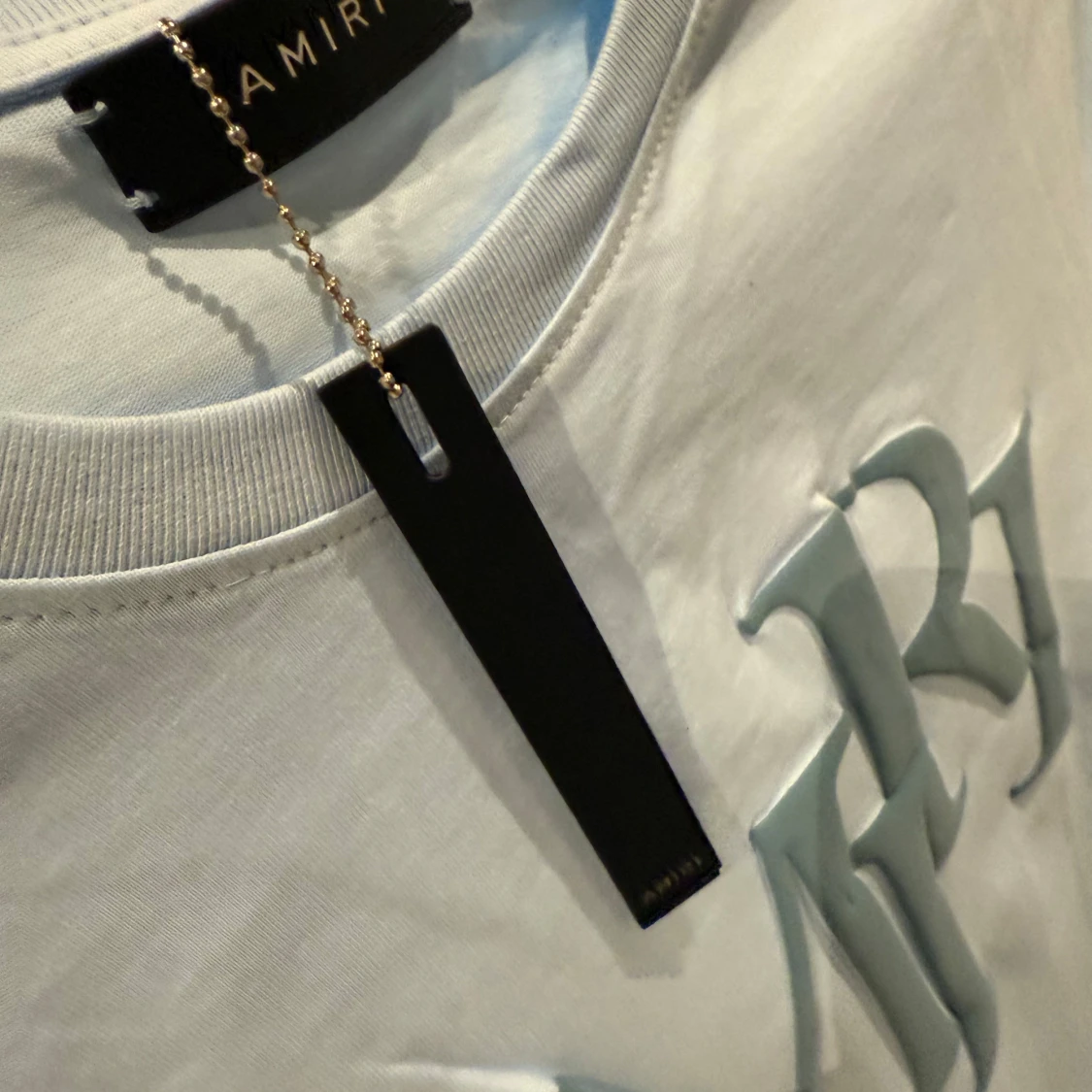 Ljusblå t-shirt från Amiri - 1