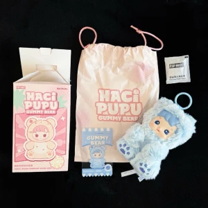 Hacipupu Gummy Bear (Blueberry) - Selling ’Blueberry Flavor’ from ’Hacipupu Gummy Bear Series’ 🫐🧸In brand new condition as he’s been boxed up since purchase from Pop Mart’s official website (box, card and bag are all included) ✨
