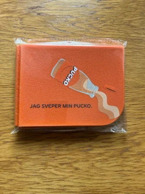 Sittunderlag PUCKO - Oanvänd, nyskick.