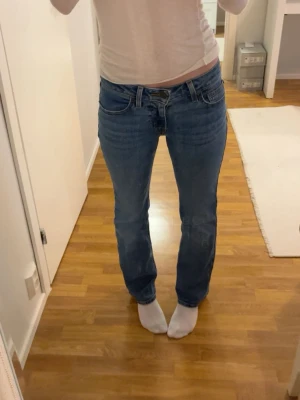 Levi’s superlow bootcut jeans size 24 - Levi’s Superlow Bootcut jeans in size 24, length 32. In perfect condition. 💞 Worn fewer than 5 times and look as good as new. They have a really flattering fit!  Feel free to message me if you have any questions or would like to make an offer. I’m happy to consider offers.  Original retail price: €90. Fast shipping!