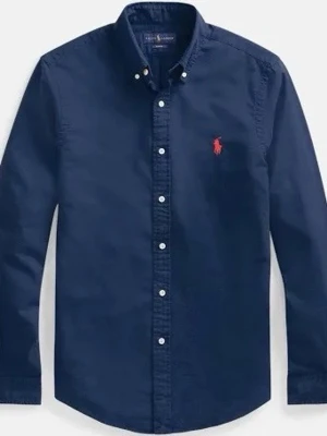 Marinblå Ralph Lauren Skjorta - Klassisk marinblå skjorta från Ralph Lauren i bomull med knappar framtill och button-down krage. Ikonisk röd broderad logga på bröstet. Perfekt för en stilren och tidlös look. Storlek XXL vilket motsvarar storlek S i herr storlek