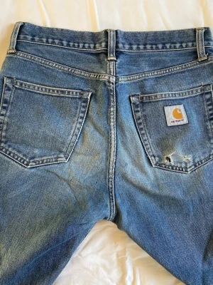 Carhartt jeans - Straight fit jeans från Carhartt, modellen heter ”pontiac pant” storlek 29x32 