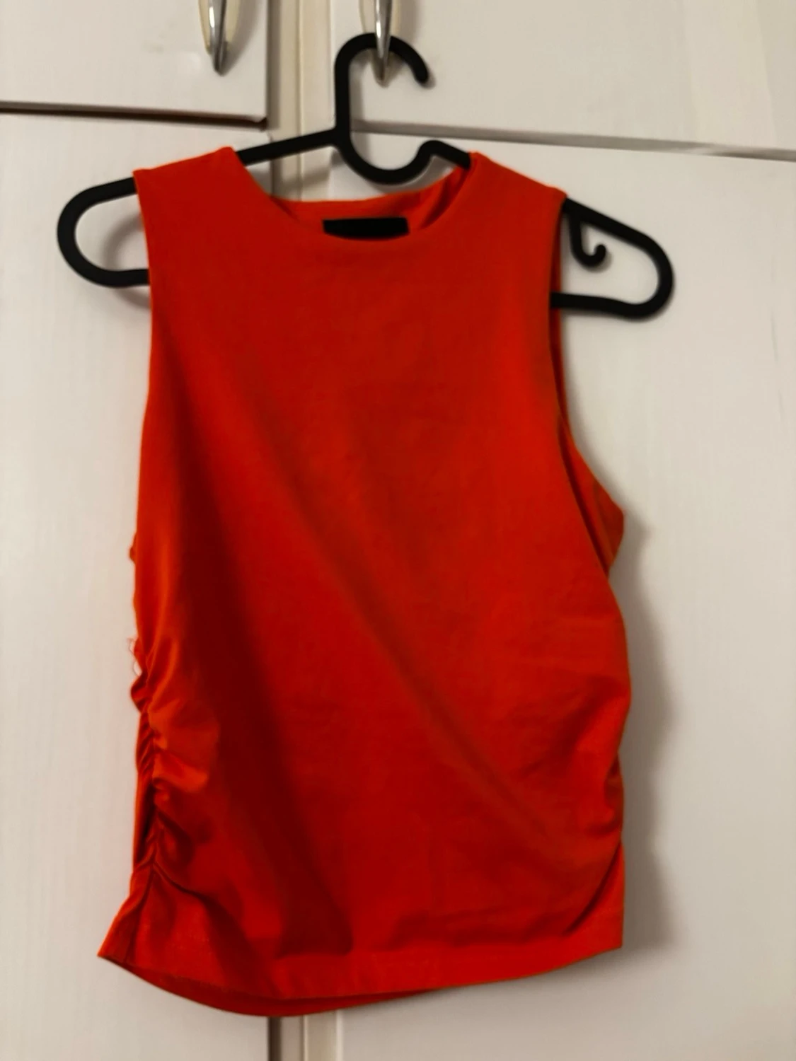 Orange ärmlös set