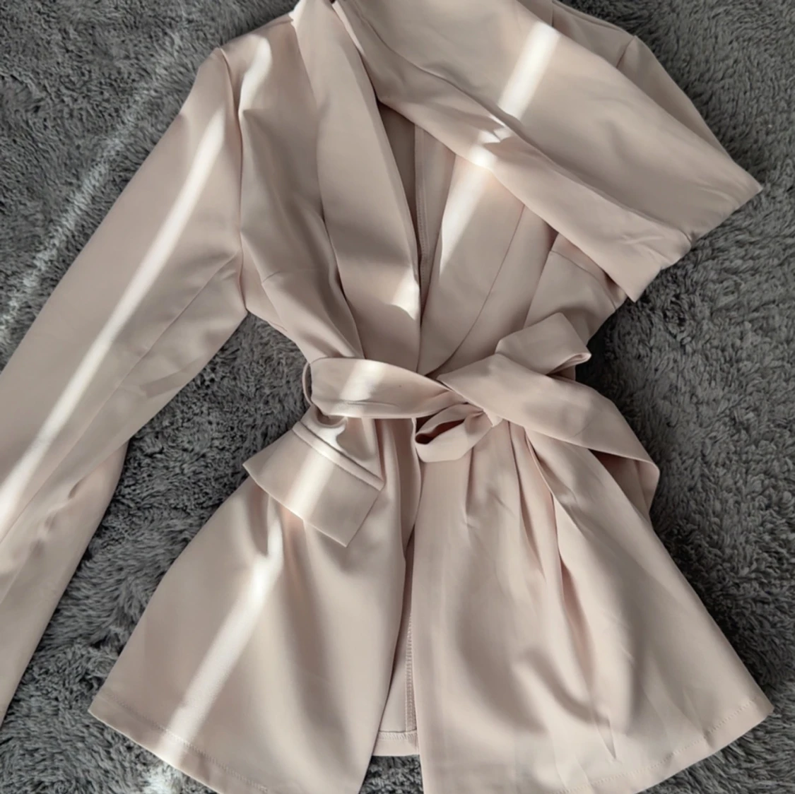 Kavaj med knytskärp