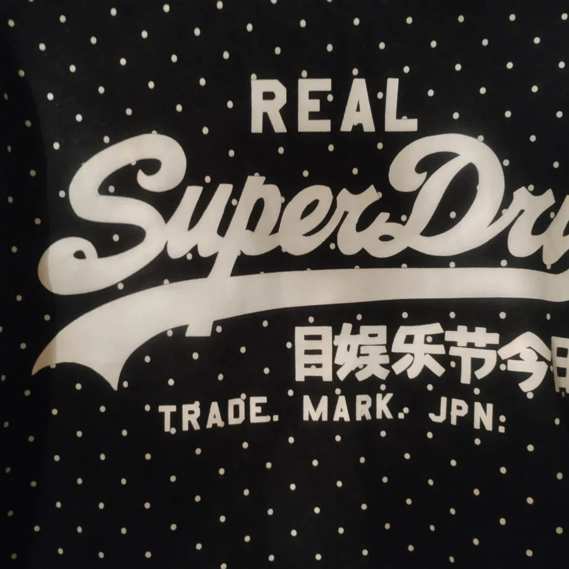 Svart tröja med prickigt mönster från SuperDry - 90