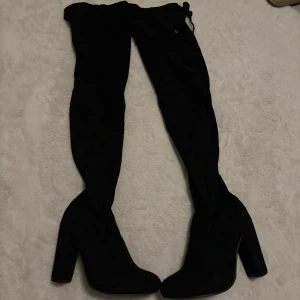 Stövlar med klack - Använda 1 gång