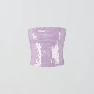 Lila paljett tubtopp - Tubtopp i stretchig trikå med paljetter. Toppen är lila och har figurnära passform med dragkedjestängning i ryggen. Jättefin! Använd fåtal gånger 💜