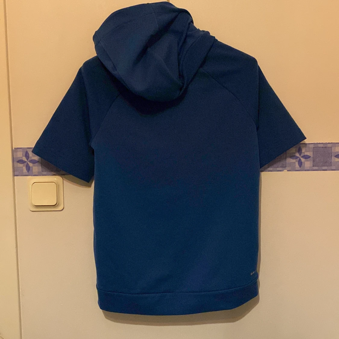 Blå kortärmad hoodie från Nike - 92