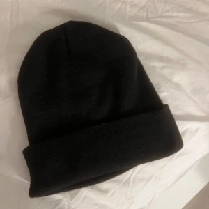 Mössa - En vanlig svart mössa