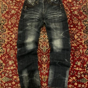 Japanska archive red pepper oririn jeans  - Jeans från Oririn Jeans. Importerade från Japan. Måtten i cm: W 39, L 108, benöppning 19, lår 29. Bara att skriva om du har frågor!