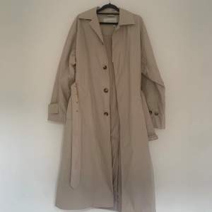 Trenchcoat. Ny 