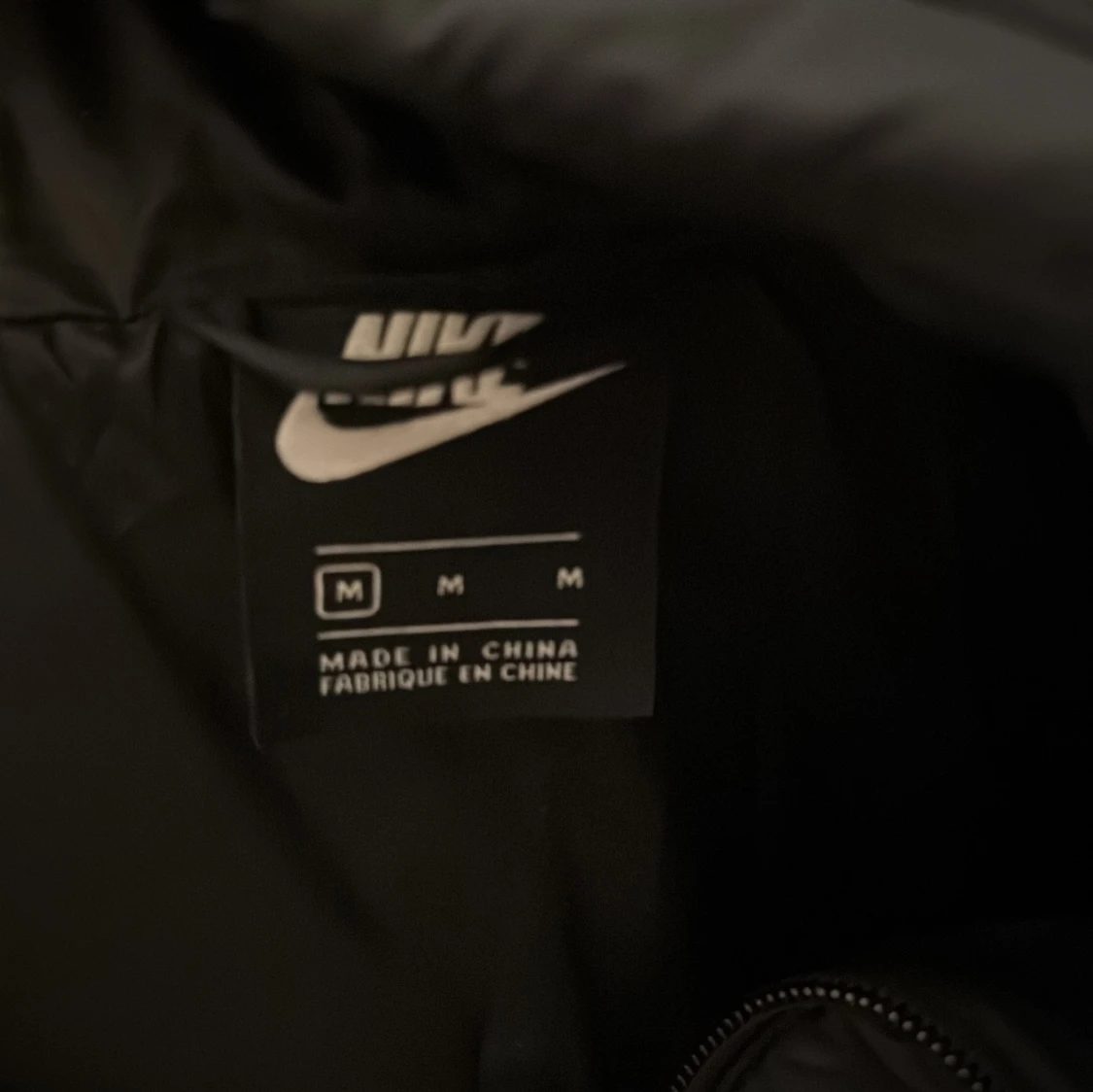 Svart dunjacka från Nike - 91