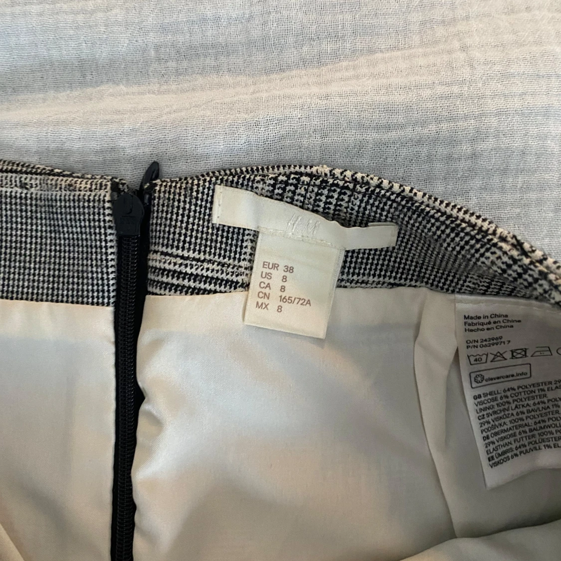 Rutig kjol med omlott - 91