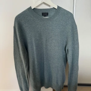 Stickad tröja Club Monaco - Stickad tröja från Club Monaco i storlek M i 100% ull. Använd Max 3 gånger