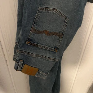 Blå jeans från Nudie Jeans - Snygga blå jeans från Nudie jeans thin finn W32L34