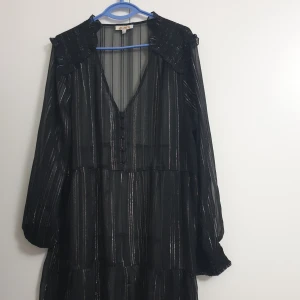 Dresd - Party's dress, black color with glitter silver tiny vertical lines
