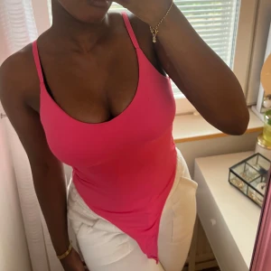 Rosa body  - Endast använd 1 gång!