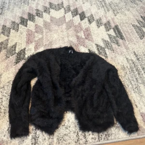 Boleros  - En svart boleros, från H&M, storlek XS