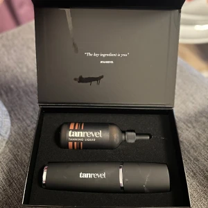 Tan Reveal - Tan reveal maskin med full tanning vätska. Använd ca 2 gr.