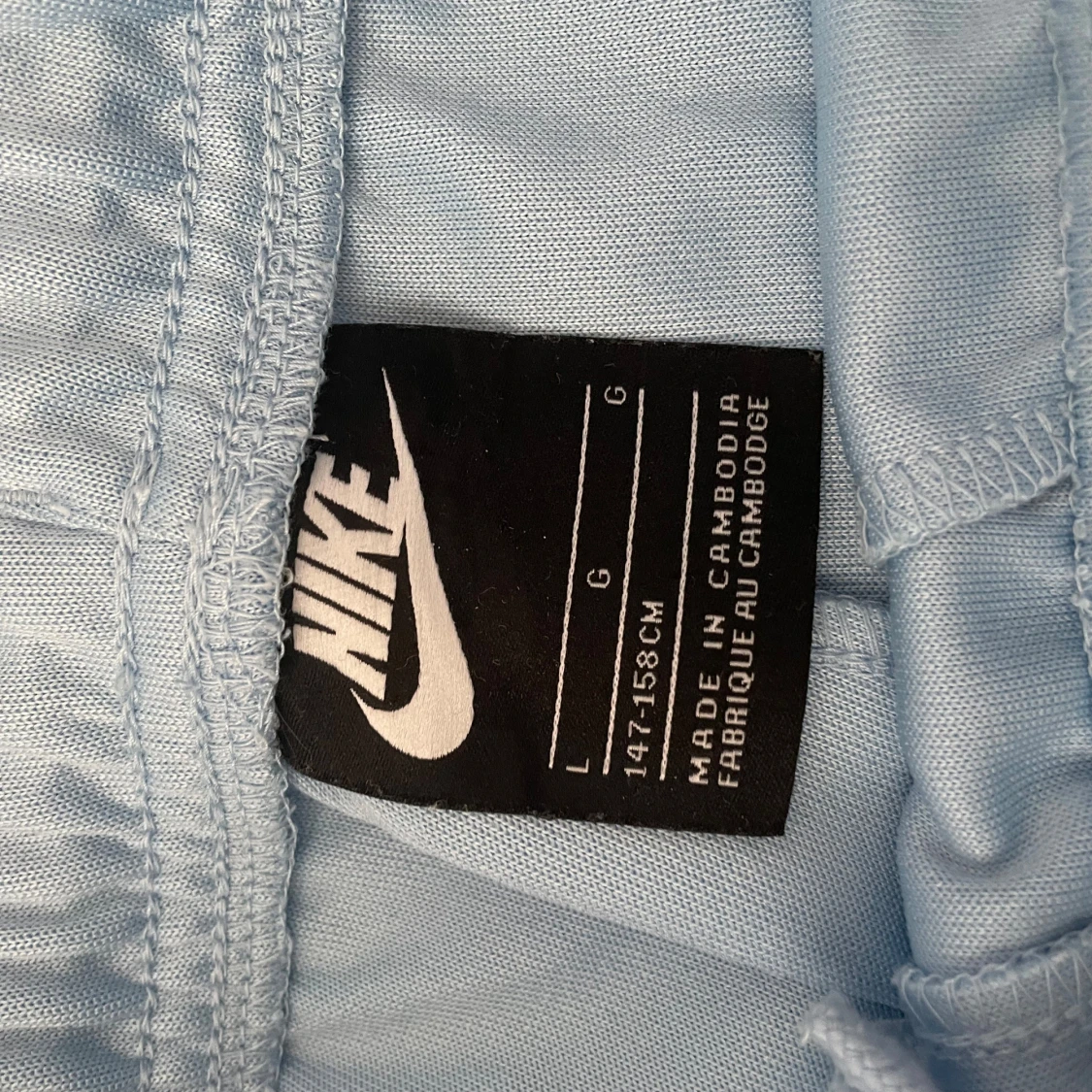 Ljusblåa Nike byxor - 91