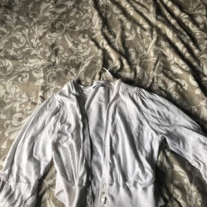 En kofta - Aldrig använd 