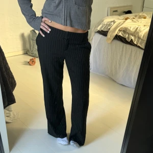 Kostymbyxor  - Lågmidjade kostymbyxor 