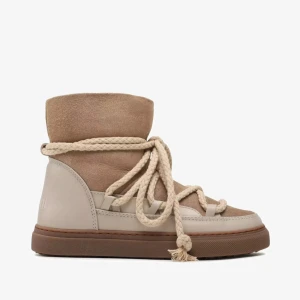 Inuikkii beiga - Säljer mina jätte fina beiga inuikii skor då de är för små, realativt bra skicka skriv, snöret har gått upp en aning.  Skriv för egna bilder, nypris 3000