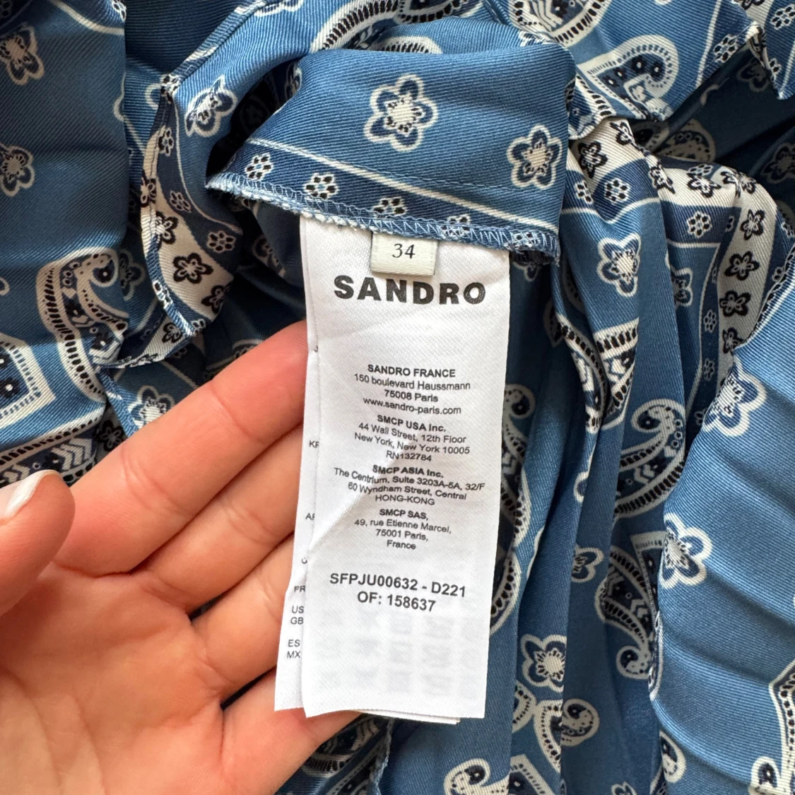 Blå mönstrad klänning från Sandro - 90