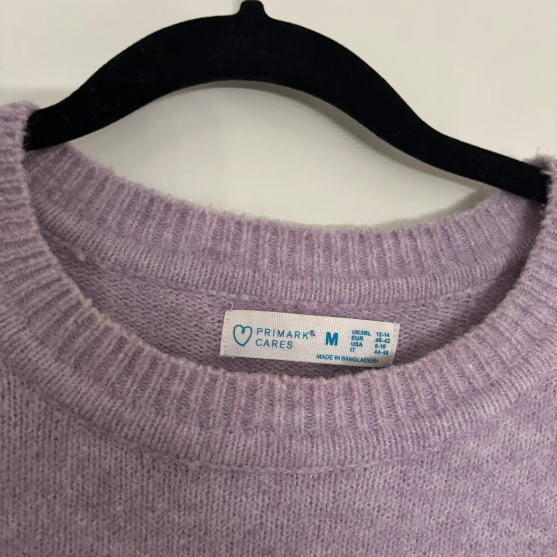 Stickad, lila tröja - 91