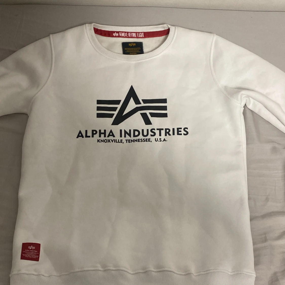 Vit sweatshirt från Alpha Industries
