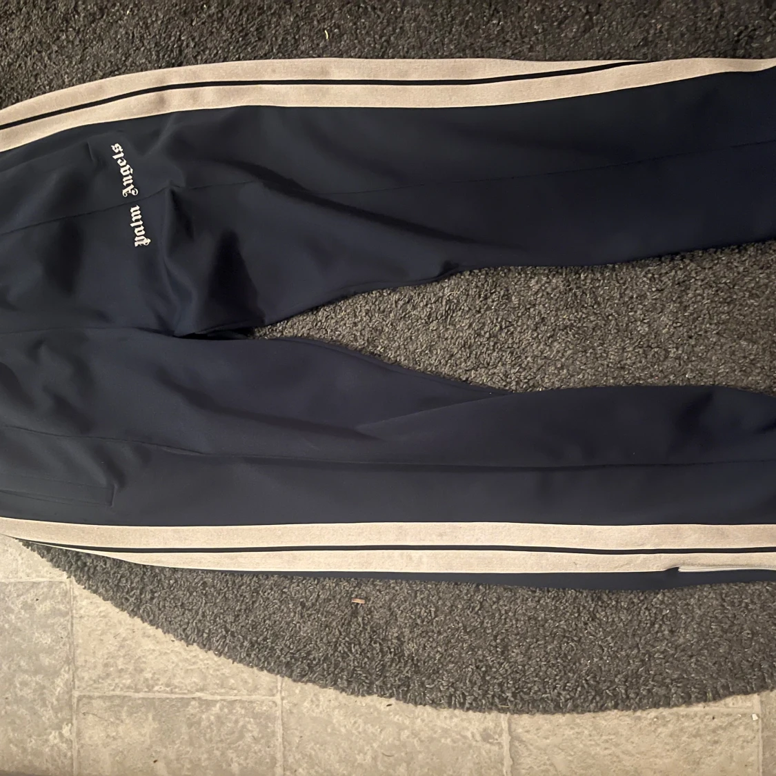 Mörkblå byxor från Palm Angels