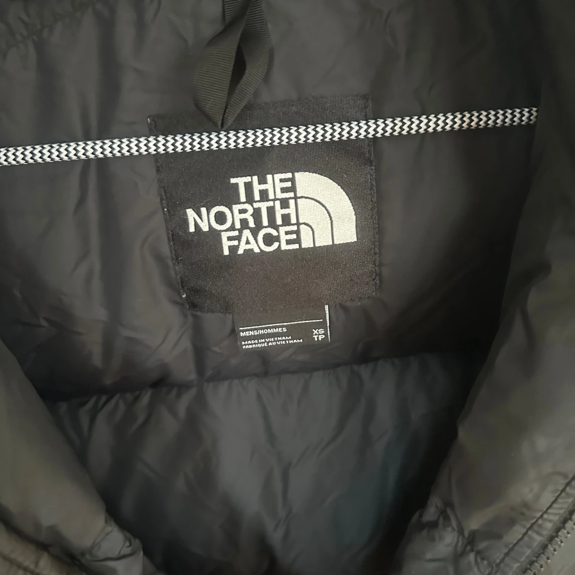 Svart pufferjacka från The North Face - 90