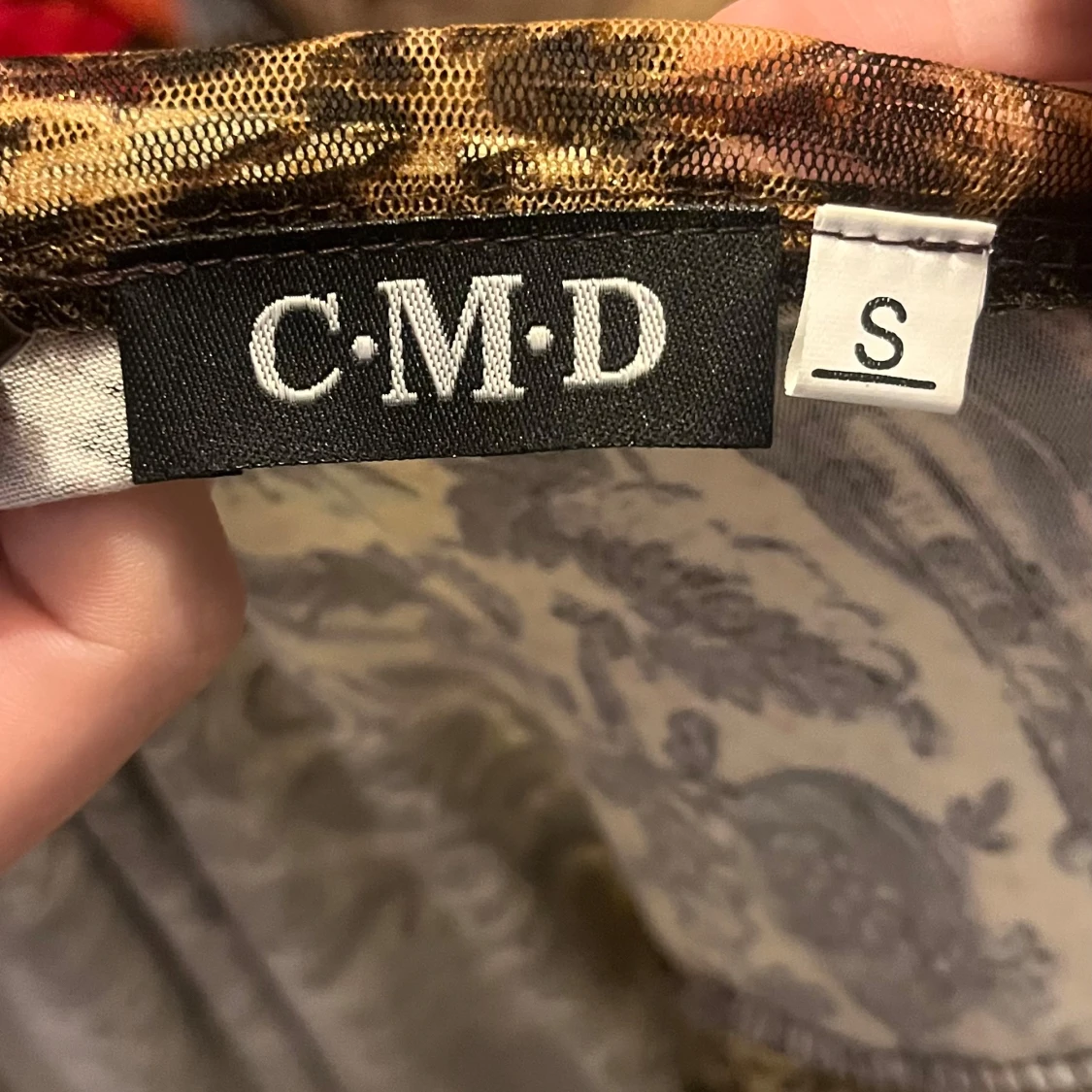 Mönstrad omlottopp från CMD - 91