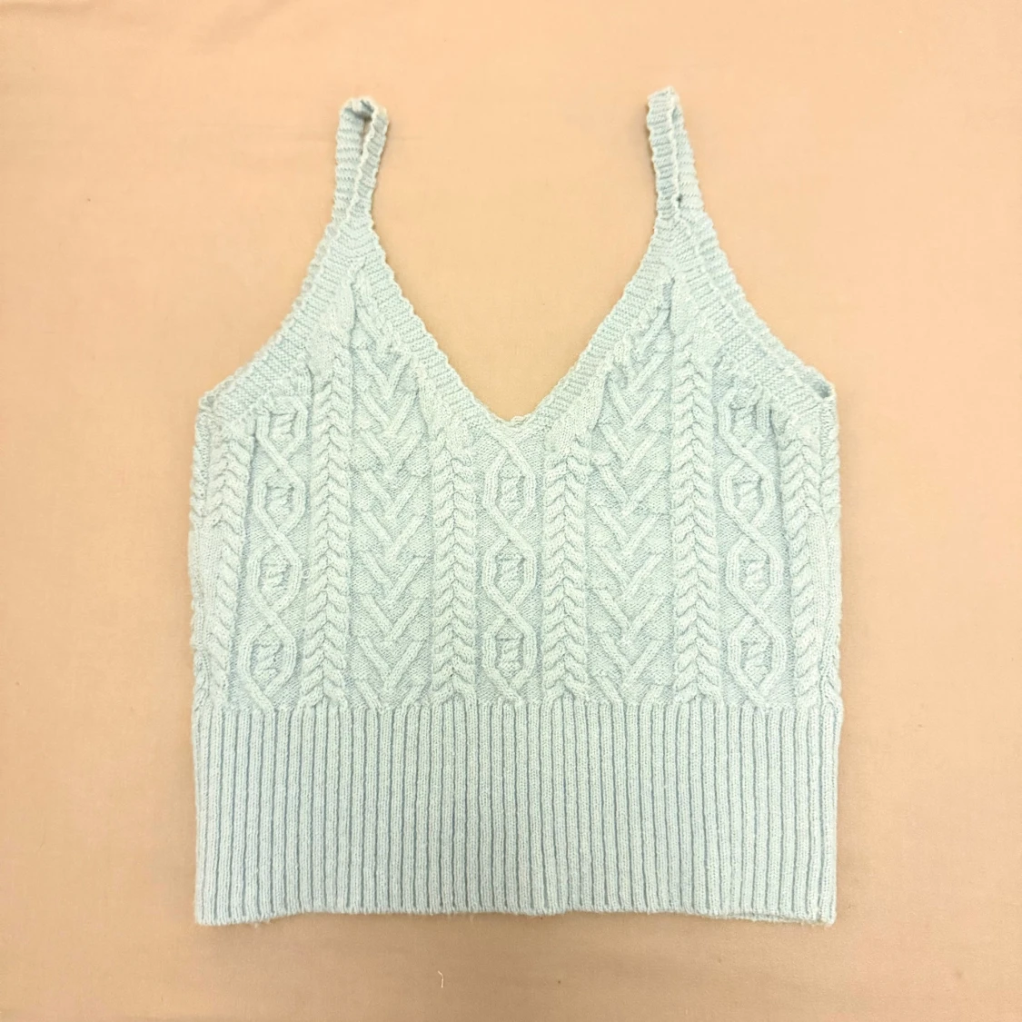 Ljusblå stickad linnetopp