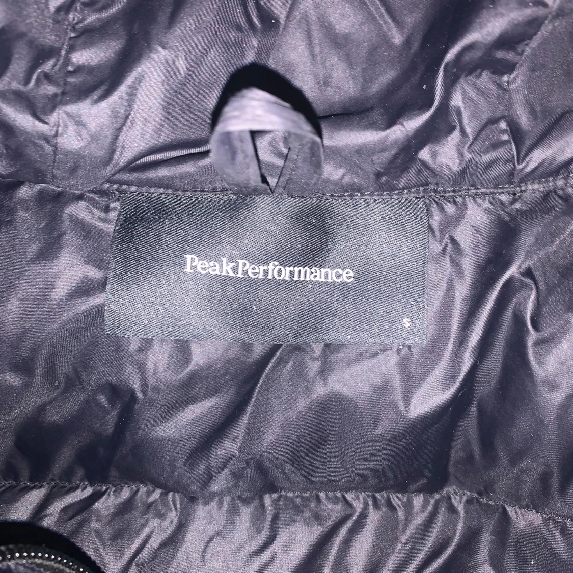 Svart dunjacka från Peak Performance - 91