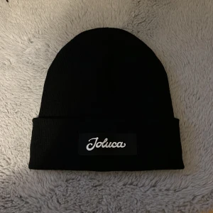 JLC mössa - Tja säljer nu en JLC mössa som jag fick av dem. 