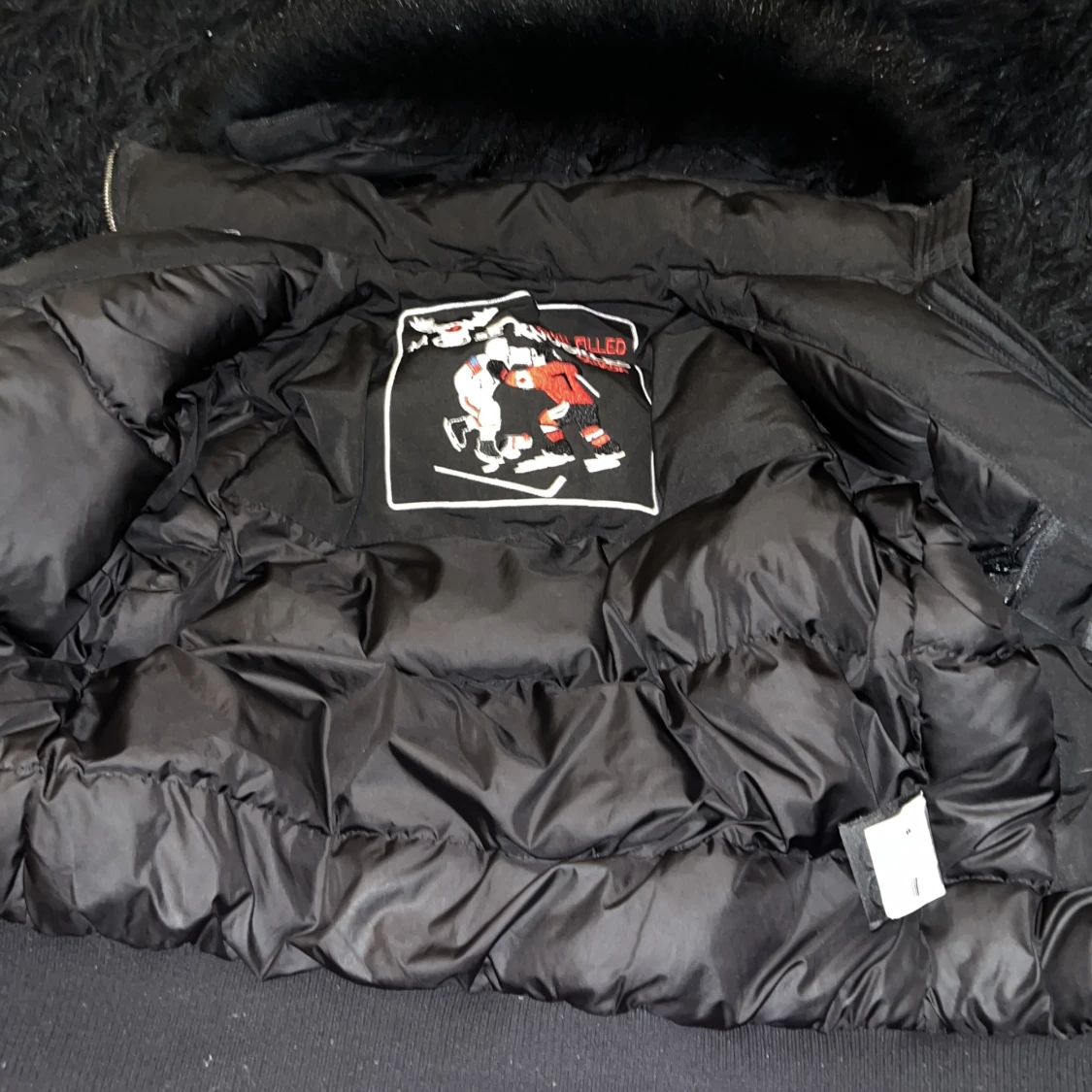 Svart pufferjacka från Moose Knuckles - 90