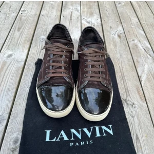 Lanvin - Säljer ett par snygga bruna sneakers från Lanvin i bra skick.