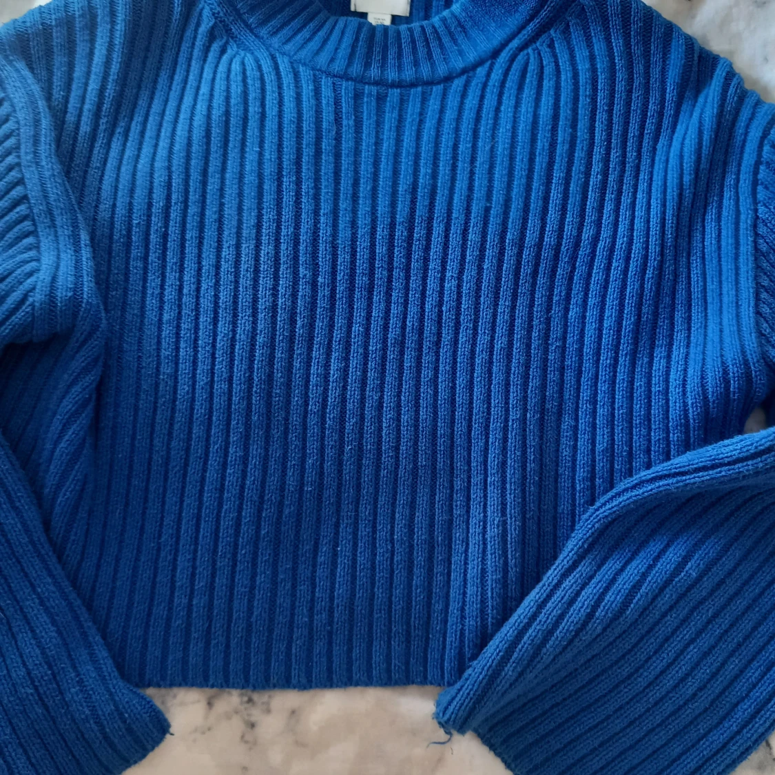 Blå stickad tröja från H&M - 90