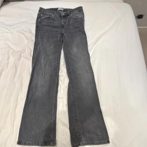 Jeans bootcut  - Lågmidjade bootcut jeans från lager 157, storlek xs short