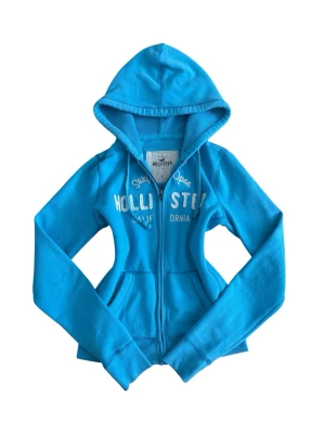 Vintage blue Hollister zip up hoodie  - Vintage cute blue Hollister zip up hoodie in a size XS. I’m selling them because they’re unfortunately too small for me 🎀😔 but they’re super cute!! 