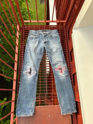 Average Joe Nudie Jeans - Riktigt coola jeans med fantastisk mending. Storlek W33L36. 