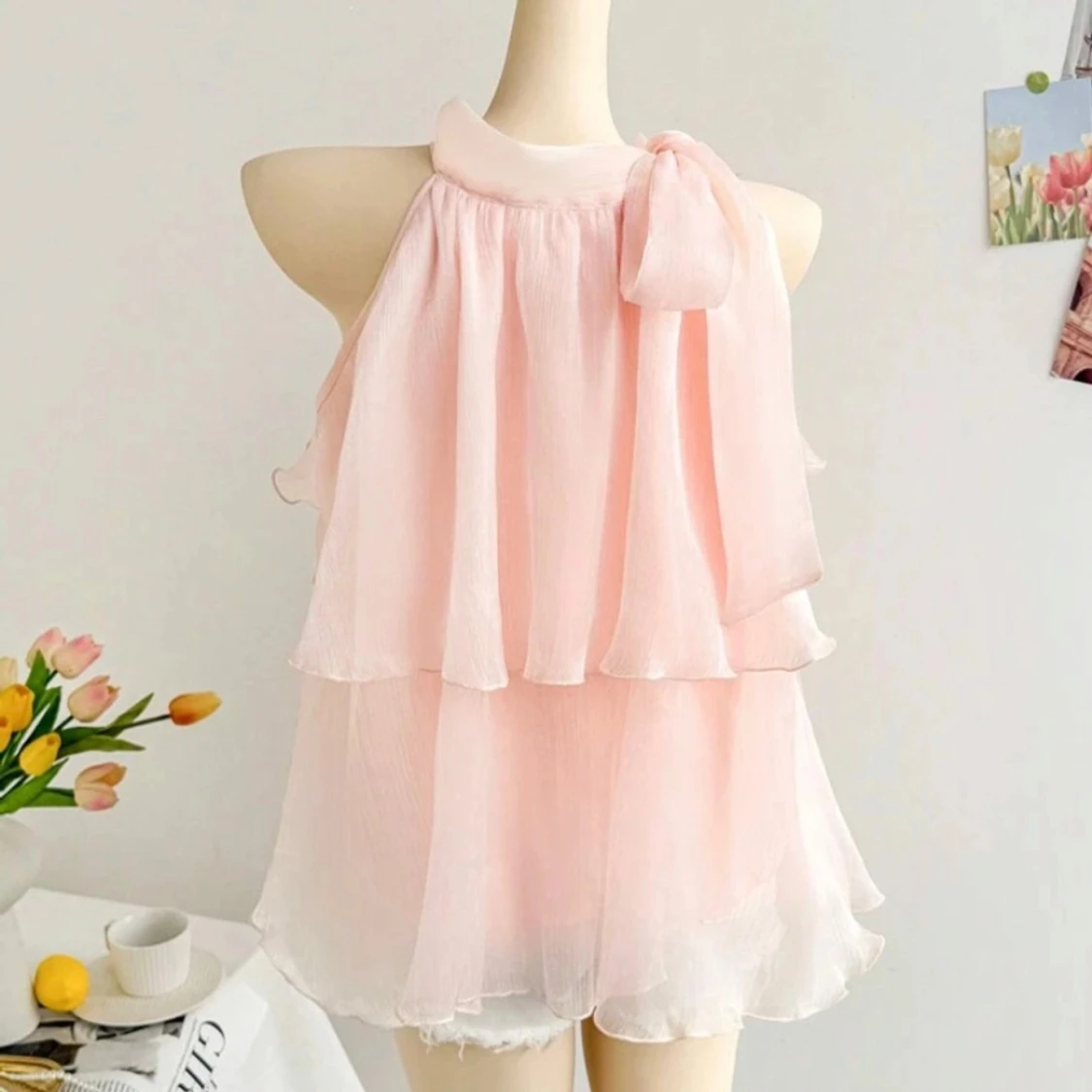 Ljusrosa ärmlös blus med rosett - 1